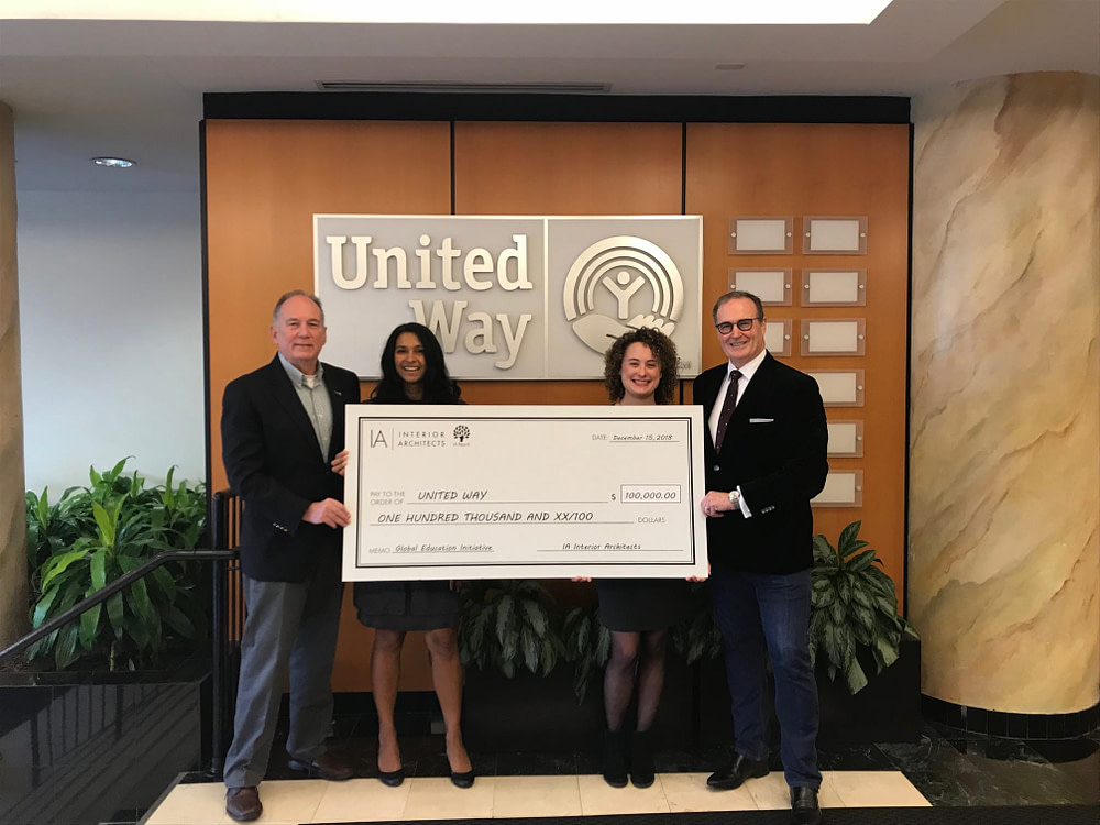 David Bourke presents the United Way With a Donation