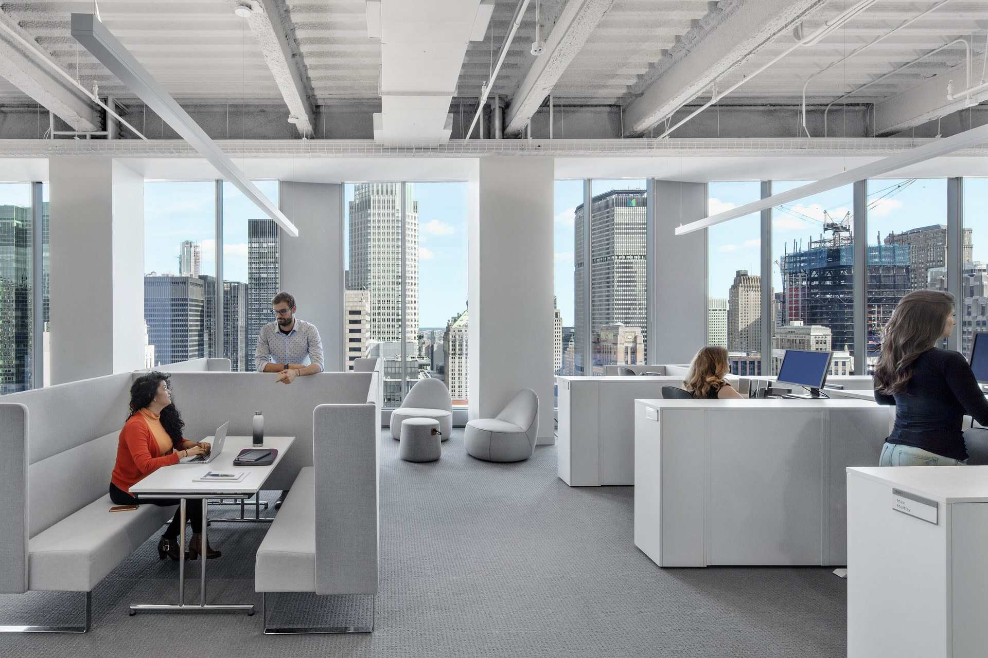 The group work space features full-length windows