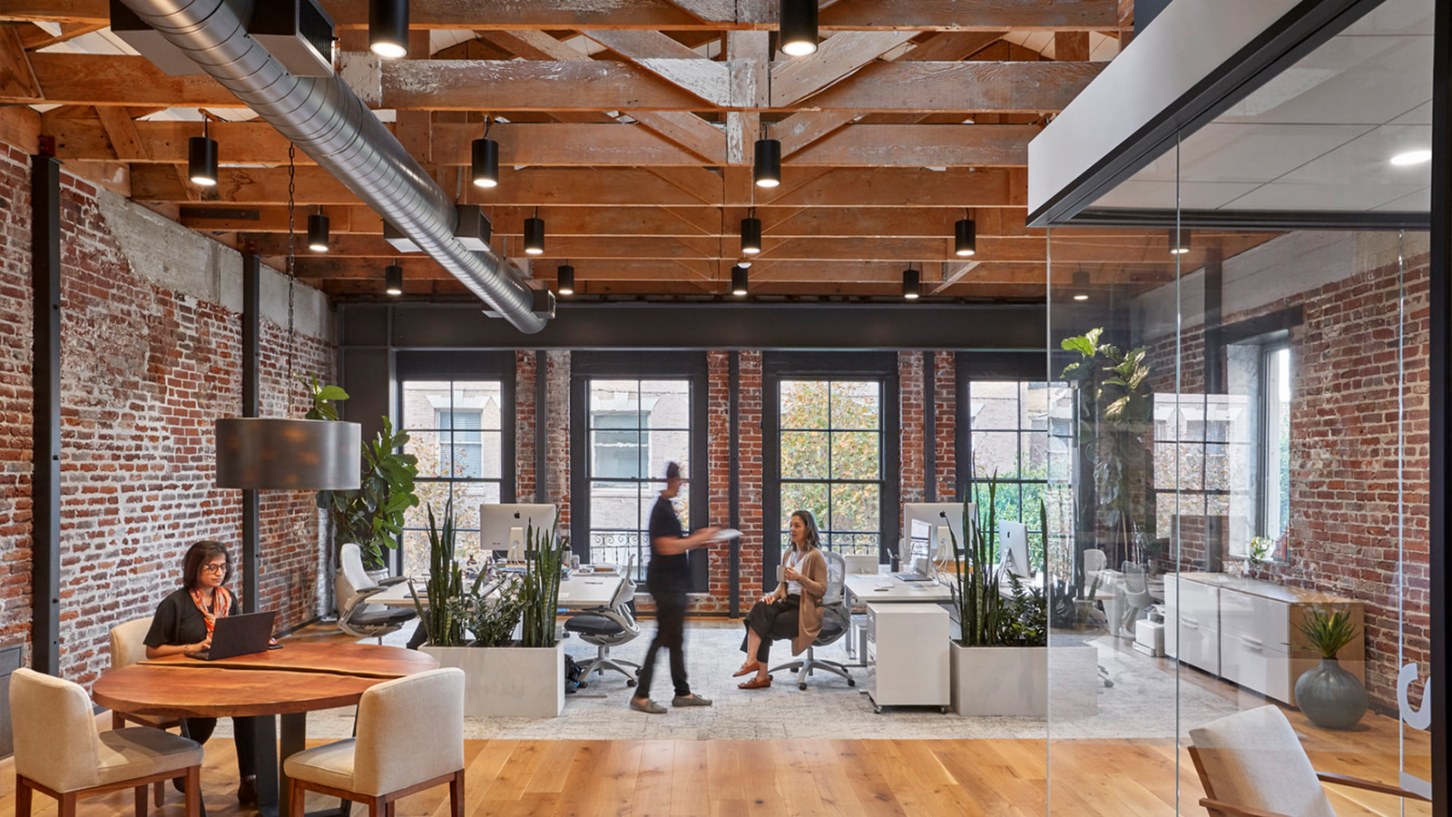 The brick-walled workspace of 01 Advisors