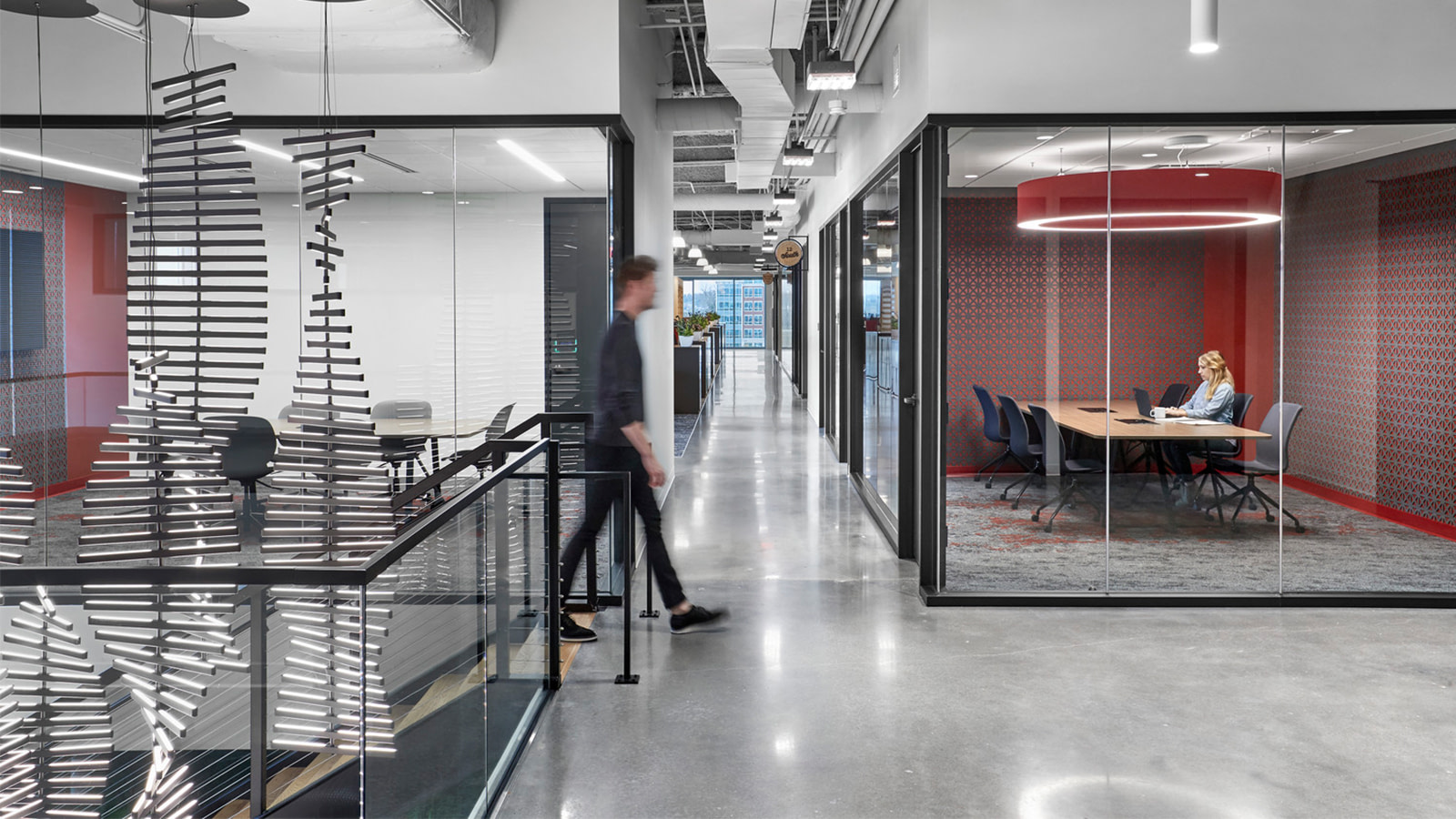 Corridors and alleyways help employees navigate the space that's filled with indoor plants
