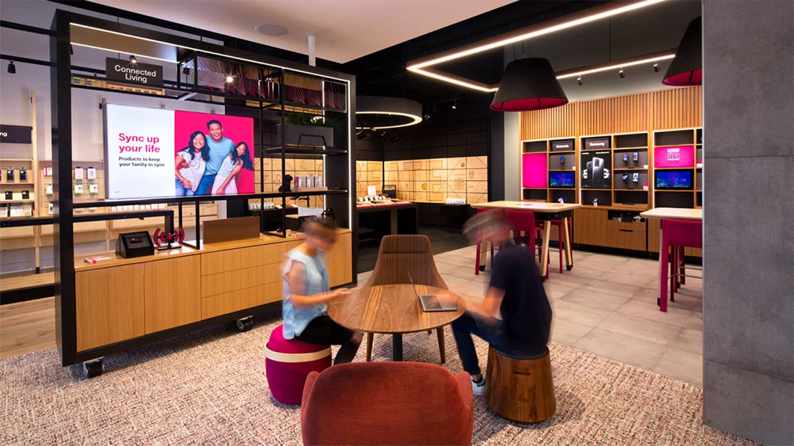 Guests visit a T-Mobile Experience Center