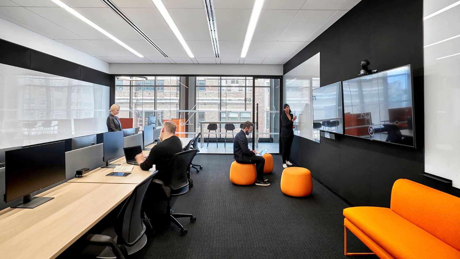Yext NYC offers flexible seating around standing desks