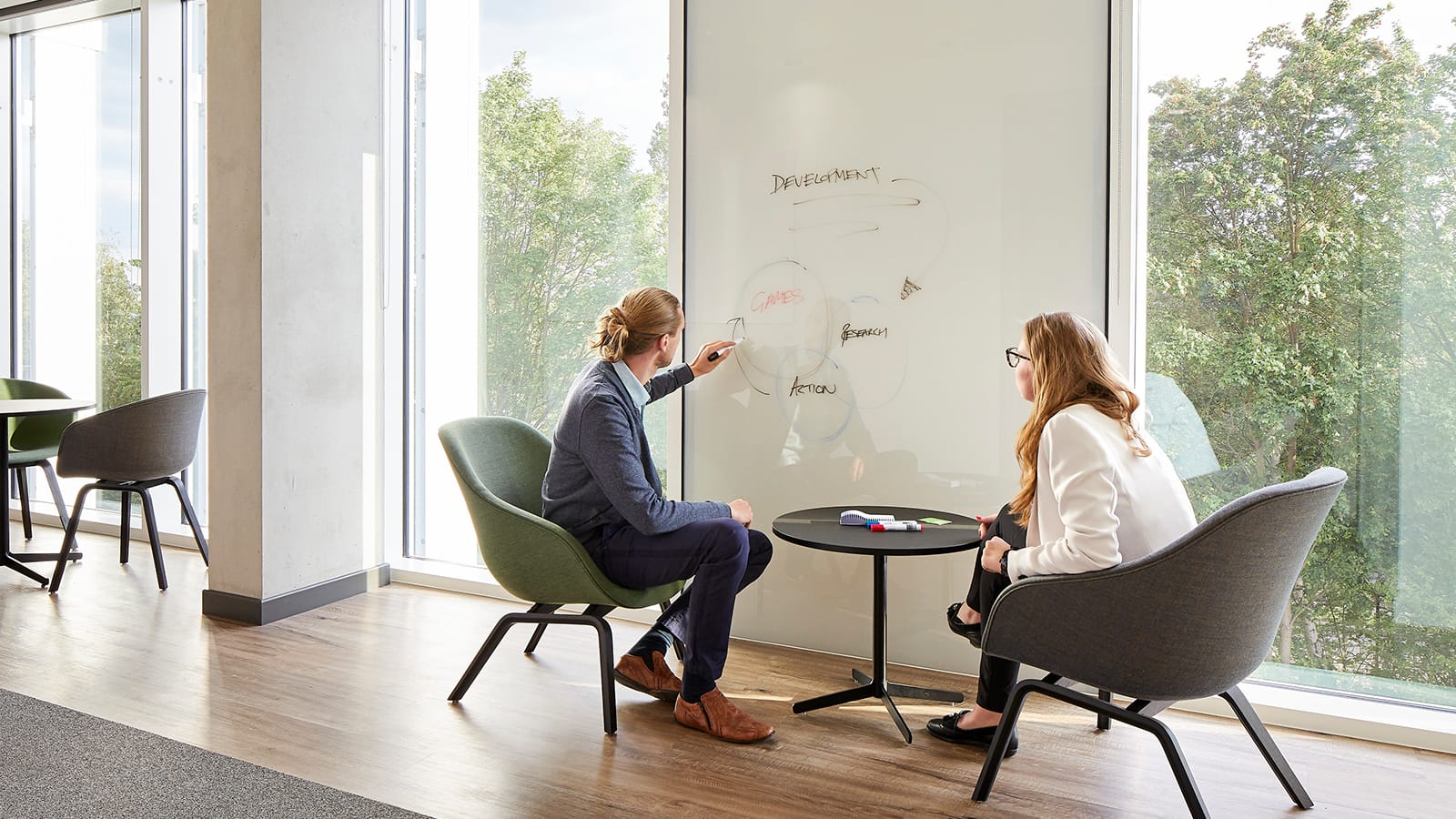 A casual collaboration zone at Frontier Developments' technology workplace.