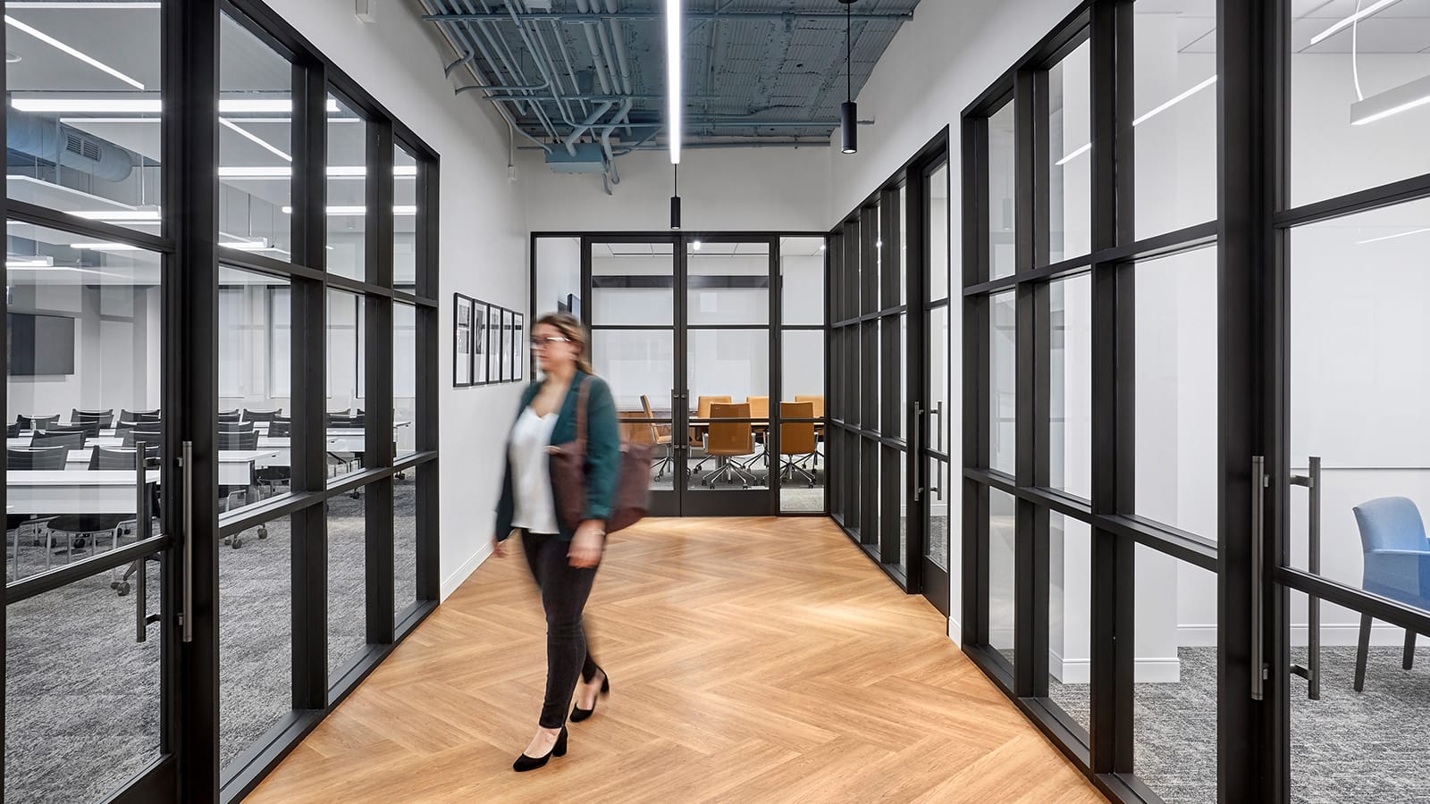 A hall leading to multiple meeting spaces within the Leviton showroom space.
